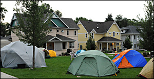 Half a dozen tents pitched on the lawn