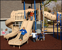 Kids playing on the slides